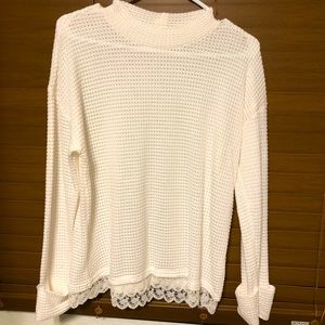 Light knitwear sweater with lace trim